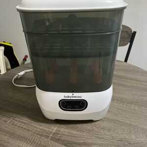 Baby Brezza Bottle Sterilizer and dryer in White and Gray